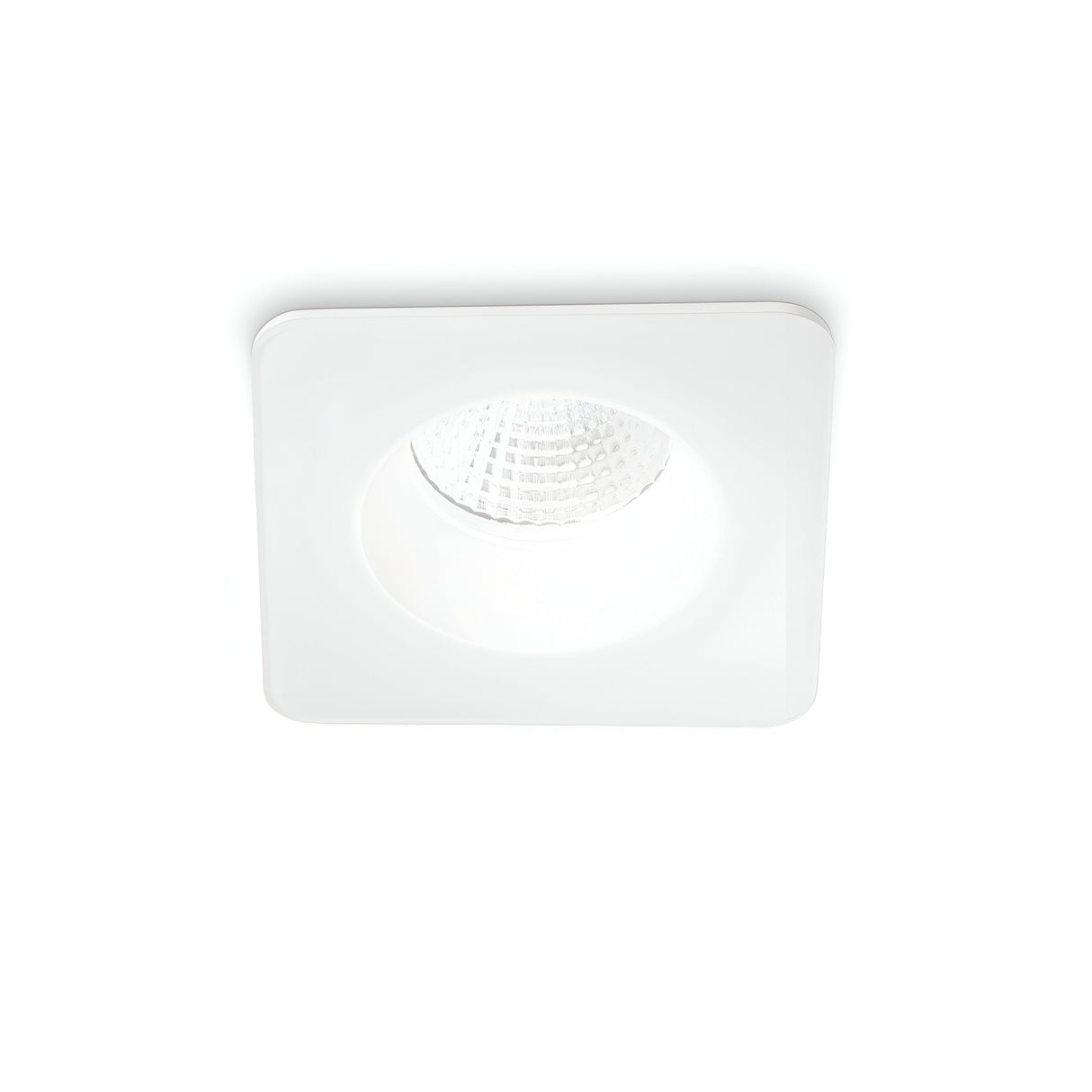The Omera LED Square Recessed Downlight 8W 3000K - White features a sophisticated design with its white frame and reflective inner surface, providing energy-efficient lighting. The light is currently on, set against a plain white background to highlight its sleek appearance.