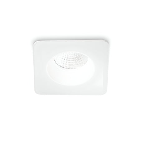 The Omera LED Square Recessed Downlight 8W 3000K - White features a sophisticated design with its white frame and reflective inner surface, providing energy-efficient lighting. The light is currently on, set against a plain white background to highlight its sleek appearance.