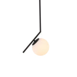 Niori Vetra Opal Glass Small Pendant Light in black, featuring an angled matt black arm and frosted white globe on a plain background.