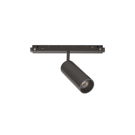 A black Luxeon LED Magnetic Track Spotlight 12W 3000K is mounted on a straight, horizontal track, aiming downward against the white background for energy efficiency.