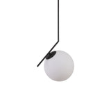 Niori Vetra pendant light with a frosted opal glass globe suspended from a matt black angled metal arm, shown on a plain white background.