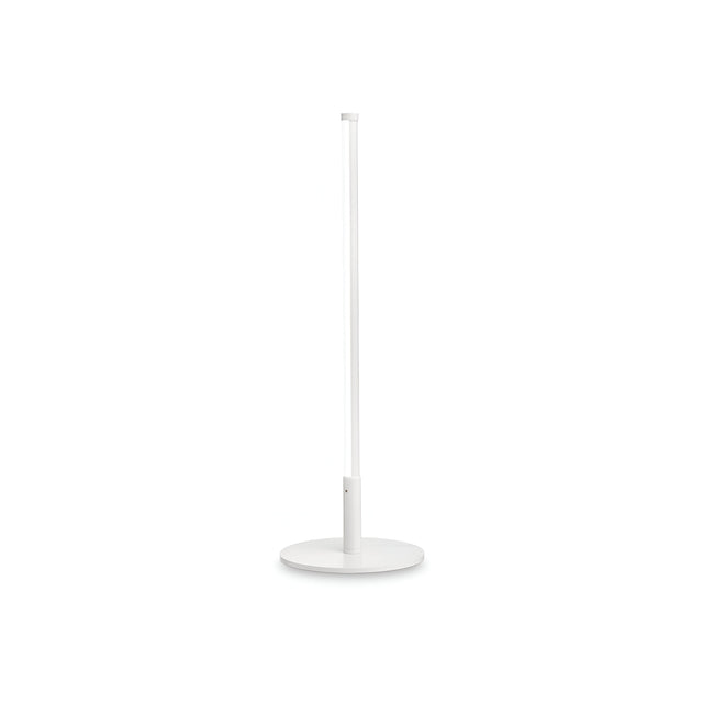 The Wave LED Table Lamp in white showcases a minimalist aesthetic, featuring an LED bulb with adjustable color temperature. Its sleek, vertical design and circular base create an elegant presence against a plain white background.