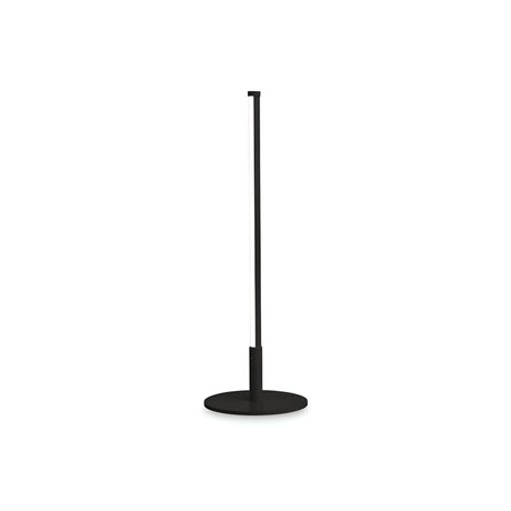 Introducing the Wave LED Table Lamp in Black, a stylish and modern lighting solution with a slender vertical design and a circular base, equipped with an energy-efficient LED bulb. This lamp emits light from a narrow strip along its length and has a color temperature of 3000K.