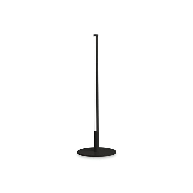 Introducing the Wave LED Table Lamp in Black, a stylish and modern lighting solution with a slender vertical design and a circular base, equipped with an energy-efficient LED bulb. This lamp emits light from a narrow strip along its length and has a color temperature of 3000K.