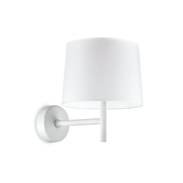 The Aethera Wall Light - White, featuring a minimalist design with a cylindrical shade and straight arm, gracefully extends from a circular base against a plain white backdrop. Its contemporary style provides customizable lighting to match any ambiance.