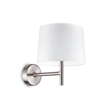 Introducing the Aethera Wall Light - Silver/White, a modern lamp featuring a brushed metallic arm and circular base paired with a white cylindrical lampshade. Its sleek, minimalist design offers adjustable lighting and is elegantly showcased against a plain white background.