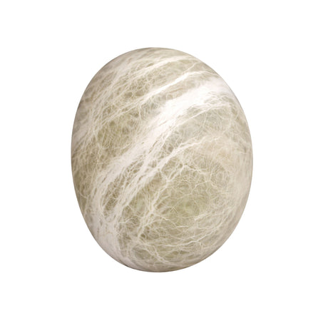 A close-up of the Orvani LED Medium Oval Alabaster Wall Light in Soft White highlights the unique texture and gentle glow of natural Spanish alabaster, perfect for elegant wall lighting.