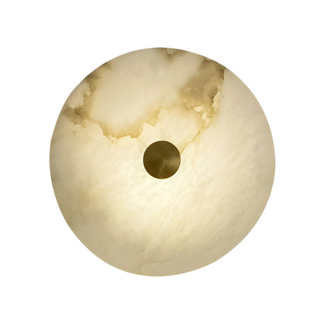 The Caldrisa LED Small Circular Plate Alabaster Wall Light features round, translucent Spanish alabaster with natural beige and brown veining, a central circular fixture, and emits a soft white glow with brushed brass accents.