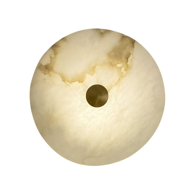 The Caldrisa LED Small Circular Plate Alabaster Wall Light features round, translucent Spanish alabaster with natural beige and brown veining, a central circular fixture, and emits a soft white glow with brushed brass accents.