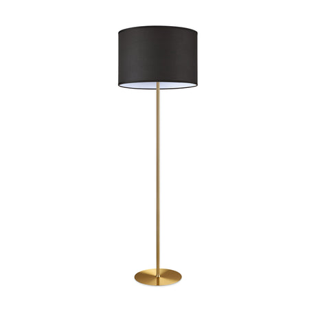 An Aethera Floor Lamp - Brass featuring a sleek brass base and a large black cylindrical lampshade.