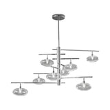 Dolce 8 Light Glass Chandelier with clear disc-shaped glass shades on a chrome staggered metal frame, shown on a plain white background.