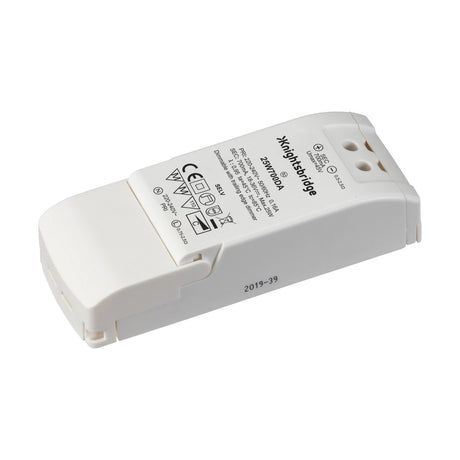 A white electrical device labeled as the Knightsbridge 25W 700mA Constant Current LED Driver 40V Dimmable features trailing edge dimmers and various technical specifications on its surface. Its rectangular shape with rounded edges includes plug or connection points, making it a versatile choice for dimmable applications.