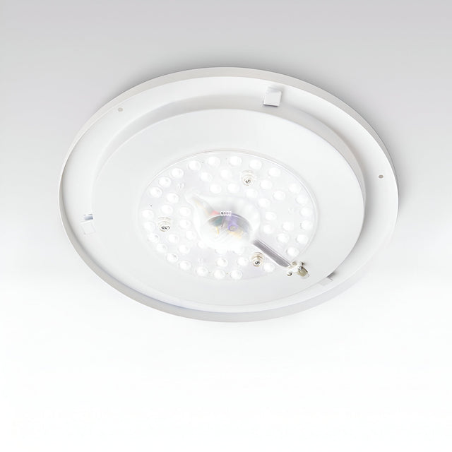 A close-up of the Mirage LED Ceiling & Wall Light 22.5W 3000K – White, 40cm showcases its energy-efficient illumination with multiple small bulbs arranged in a circular pattern. This versatile fixture seamlessly integrates with the flat white ceiling, combining modern design with functionality.