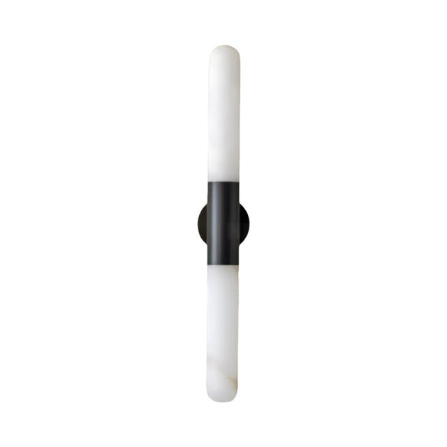 The Averin LED Alabaster Wall Light – Matte Black & Soft White is a sleek, modern fixture with a cylindrical white diffuser and central matte black bracket, ideal for contemporary spaces. Shown on a white background.