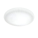 The Eclipse LED Ceiling & Wall Light 12W 3000K in white features a round design with a ribbed, radiating pattern for an elegant and modern look. This energy-efficient lighting solution emits light from the center, enhancing textures and providing a soft, ambient glow.