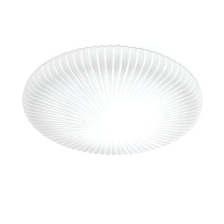 The Eclipse LED Ceiling & Wall Light 12W 3000K in white features a round design with a ribbed, radiating pattern for an elegant and modern look. This energy-efficient lighting solution emits light from the center, enhancing textures and providing a soft, ambient glow.