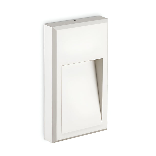 The Arcana-2 LED Outdoor Wall Light 6W 3000K in White offers a sleek, minimalist design with a rectangular shape and angular opening for energy-efficient illumination. It is crafted from durable aluminum, highlighting sharp lines and geometric forms.