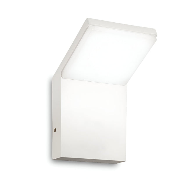 The Brillix Outdoor LED Wall Light 9W 3000K - White features a contemporary, rectilinear design with a white finish. It delivers energy-efficient illumination and emits a gentle glow that is subtly angled downward against a plain white backdrop, making it perfect for enhancing outdoor spaces.
