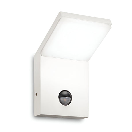 The Brillix Outdoor Motion Sensor LED Wall Light 9.5W 3000K - White showcases a modern square design and includes an outdoor motion sensor centrally positioned at the bottom. It is weather-resistant and directs light downward, providing a sleek and minimalist aesthetic.