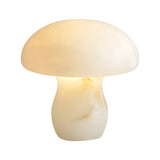 The Morfia 1 Light Large Mushroom Alabaster Table Lamp in Natural Brass features smooth, translucent alabaster and emits a soft, warm glow, shown against a plain white background.