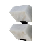 The Calyrix LED Small Stacked Alabaster Wall Light – Soft White features two rectangular alabaster-inspired shades facing opposite ways, mounted on a sleek black metal fixture for a modern sculptural look.