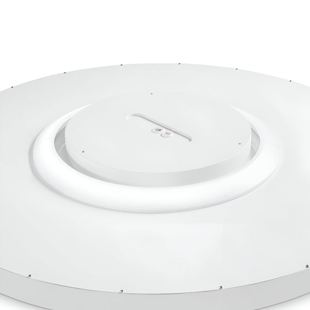A close-up of the Twilight LED Ceiling Light 12W 3000K - White, 90cm reveals a sleek, modern design with energy efficiency. The fixture boasts a central circular element surrounded by a glowing 3000K ring. Its surface is smooth and minimalistic, complemented by evenly spaced screws that enhance its sophisticated appeal.