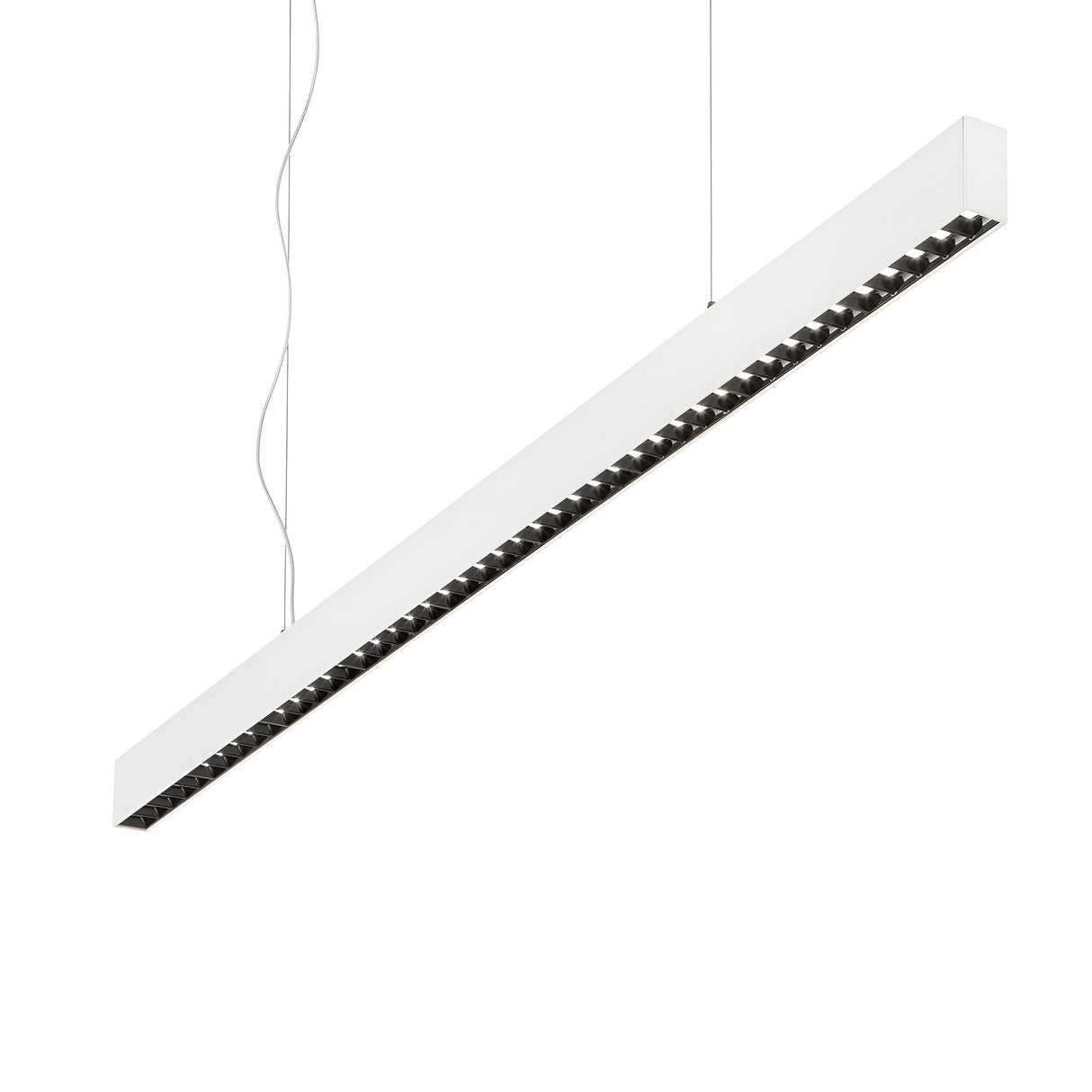 The Celine LED Linear Suspension 30W 4000K - White features a sleek, modern design with a white exterior and an interior finished in black. It's elegantly suspended from the ceiling using thin wires, while its minimalist aesthetics and glare control capabilities enhance the plain white background as it hangs at an angle, emitting a crisp 4000K glow.