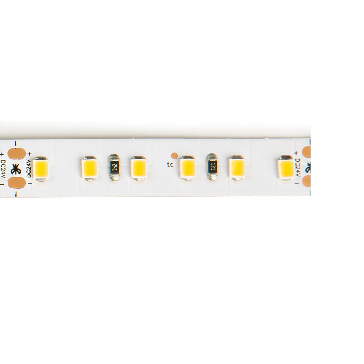 Close-up of the Ecliptus 24V Dimmable LED Strip Light 15W IP65 5m, showcasing its evenly spaced yellow LED lights on a white strip. The dimmable strip includes labeled copper contact points, appearing clean and unused against a plain white background. With a color temperature of 3000K, it provides warm illumination for any space.