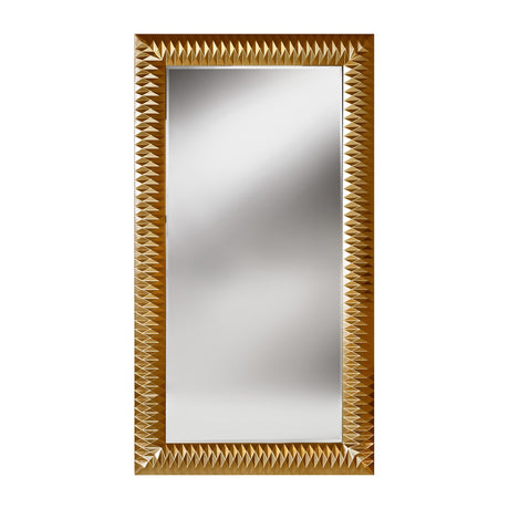 Full length rectangular mirror in a wide surround of gold leaf pyramids, each facet cut to catch the light, on a plain background.
