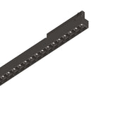 The Dune 3-Phase LED Linear Track Light features a sleek design with a black finish and measures 1065mm. This 28W, energy-efficient lighting solution, with its modern and minimalist aesthetic and multiple round light openings arranged in a row, is perfect for contemporary interior spaces.