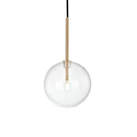 The Solarae 1 Light Glass Pendant showcases a transparent globe lampshade paired with a sleek brass finish stem, all suspended from a black cord, delivering elegant ambient lighting.