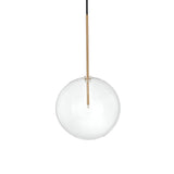 Introducing the Solarae 1 Light Glass Pendant - Brass, 25cm: This contemporary lighting fixture boasts a clear globe paired with a chic, vertical antique brass rod at its core. Its minimalist design beautifully highlights the suspended spherical shape against a pristine white backdrop.