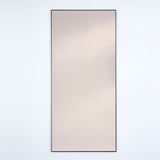 Lucka full-length wall mirror, 175cm rectangular design with slim black metal frame and bronze-tinted glass, shown on a plain light background.