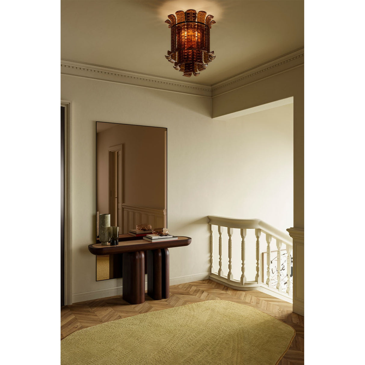 Lucka Bronze Black XXL full length mirror in a black metal frame with bronze tinted glass, mounted in a hallway above a dark wood console table.
