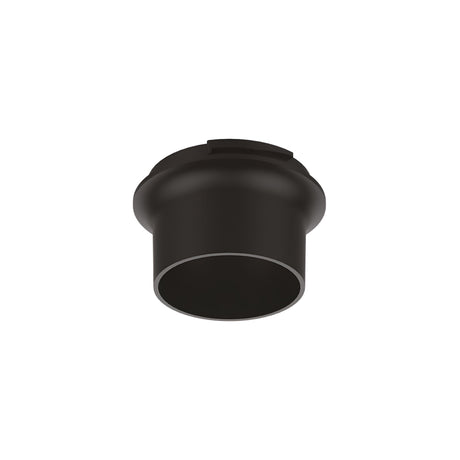 A Voltis Cylindrical Recessed Downlight Frame in black, featuring a rounded design with a flat top surface, similar to a wide, short pipe or vent, isolated on a white background and crafted from durable polycarbonate material.