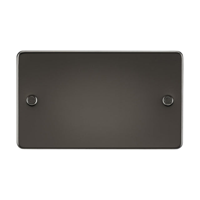 The 2 Gang Blanking Plate - Gunmetal (Flat Plate) is a dark, rectangular item with rounded edges, made from premium-grade steel. It showcases two circular elements on opposite sides, against a white background.