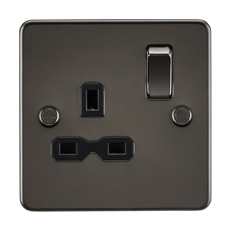 The 13A 1 Gang DP Switched Socket in gunmetal features a sleek flat plate design with a black insert, offering three rectangular plug slots and two securing screws for the metal plate.