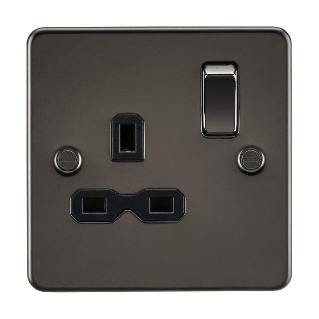 The 13A 1 Gang DP Switched Socket in gunmetal features a sleek flat plate design with a black insert, offering three rectangular plug slots and two securing screws for the metal plate.