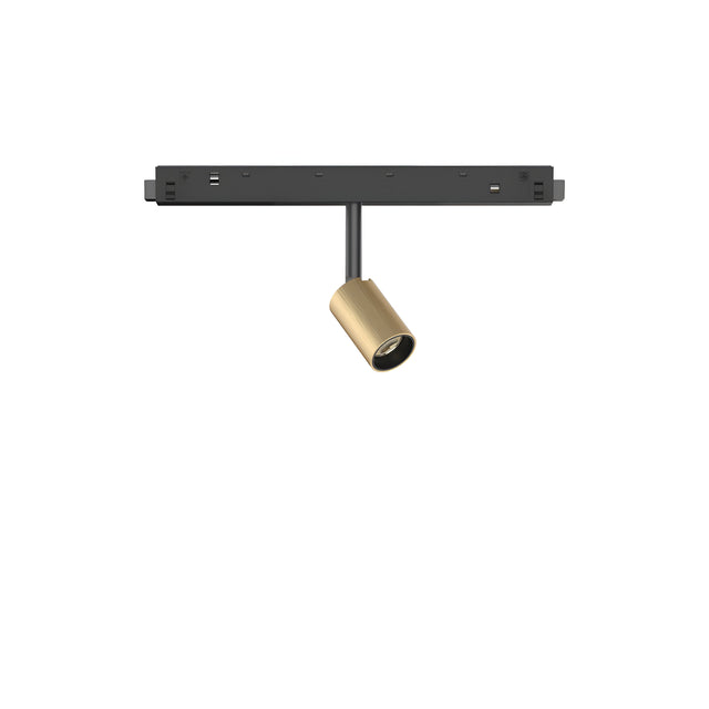 A Luxeon LED Magnetic Track Spotlight 3W 3000K in a gold and black design with a brass finish is set against a white background, featuring a gold cylindrical spotlight attached to a sleek black horizontal rail.