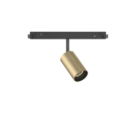 The Luxeon LED Magnetic Track Spotlight 8W 3000K - Brass is a sleek ceiling track light with a black rectangular base and an adjustable cylindrical brass spotlight, offering 3000K illumination ideal for targeted lighting in contemporary interiors.
