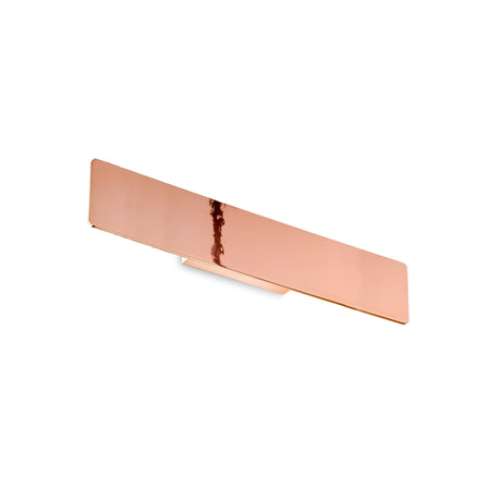 A copper-finished Flara LED Wall Light, featuring a sleek design and warm 3000K illumination, elegantly contrasts against a white background.