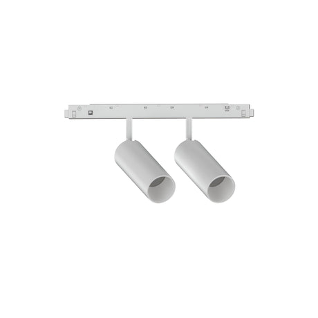 The Luxeon LED Magnetic Twin Track Spotlight 24W in white includes two cylindrical spotlights on a rectangular bar, featuring adjustable lighting direction and Luxeon LED technology, providing a warm 3000K light temperature for an ideal ambiance.