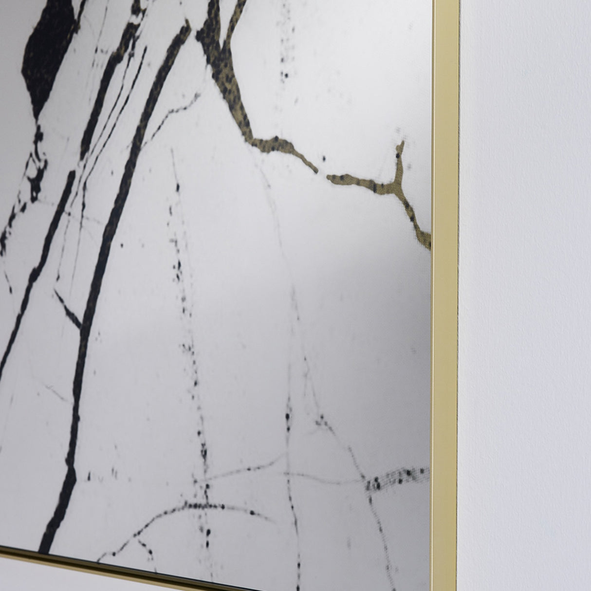 Close-up of the printed veining, black threads branching finely across the silvered surface.