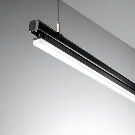 A contemporary and energy-efficient black track fixture, featuring the Dune Wide 3-Phase LED Linear Track Light 40W 3000K, 1125cm, adorns a minimalist ceiling against a light gray backdrop, ideal for commercial lighting.