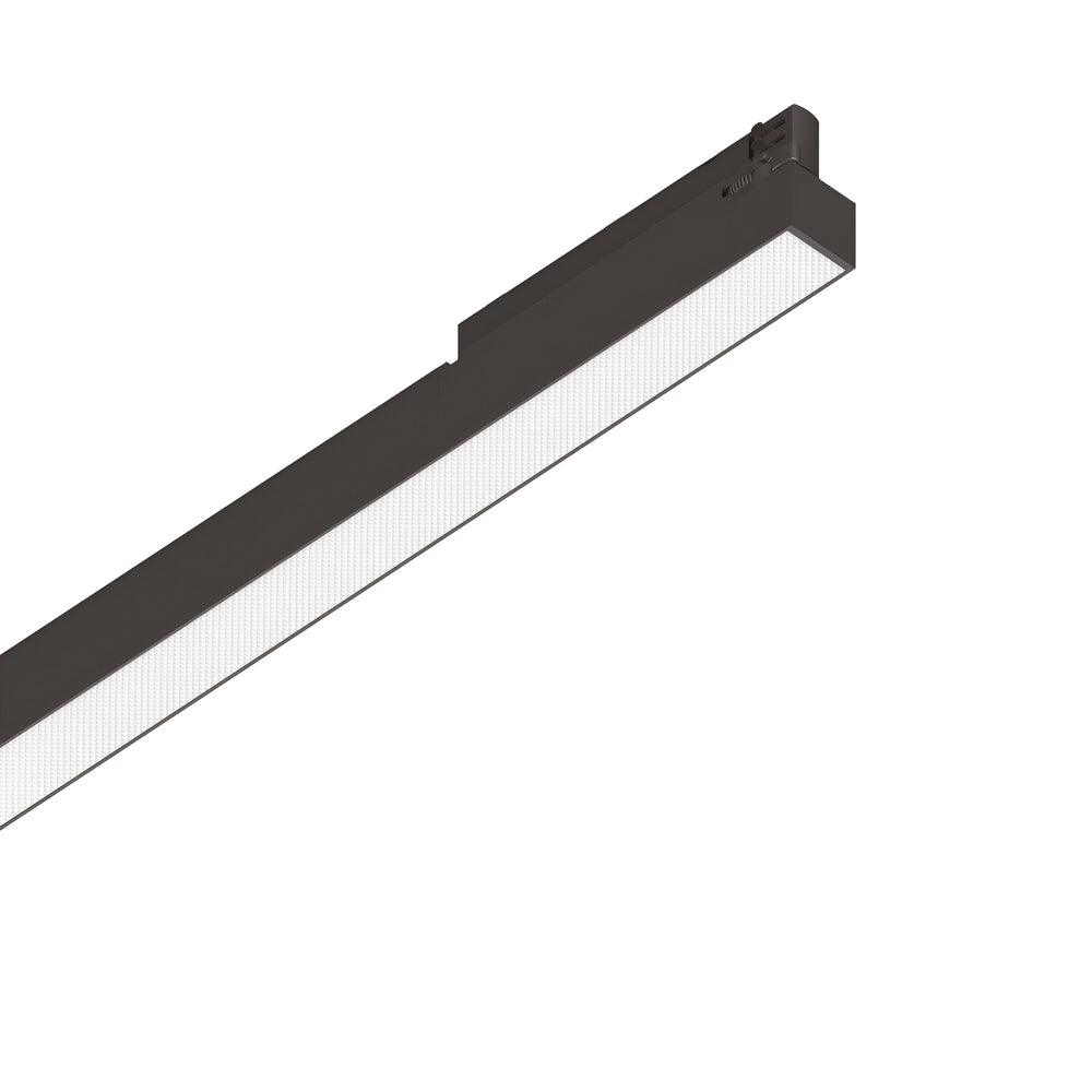 The Dune UGR 3-Phase LED Linear Track Light, with its sleek rectangular black design and grid-like translucent cover, offers a low-glare lighting solution. This 40W light features a long and narrow shape that complements modern or industrial interiors, perfectly balancing style and functionality with its UGR-rated construction.