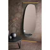 Obu Organic Full Length Leaning Mirror 178cm in Gold, with an organic rock-shaped silvered area on a clear glass rectangle, leaning against a wall in a styled room with a side table and vases.