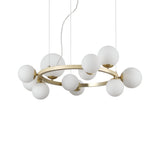 The Solana 11 Suspension Light - White exudes elegance with its gold circular frame and eleven globe-shaped bulbs. It hangs gracefully by thin wires, showcasing a white finish for a minimalist touch.