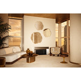 Arbo Gold Tree Ring Printed Glass Wall Mirror, 102cm, frameless irregular tree-ring shape in warm gold, shown as three mirrors above a media console in a living room.