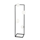The Dazzle Floor Lamp - Black/White features a sleek black metal frame with five frosted white spherical light bulbs, providing an ambient glow. Its geometric design merges modern and contemporary styles, delivering stylish vertical illumination to elevate any space.