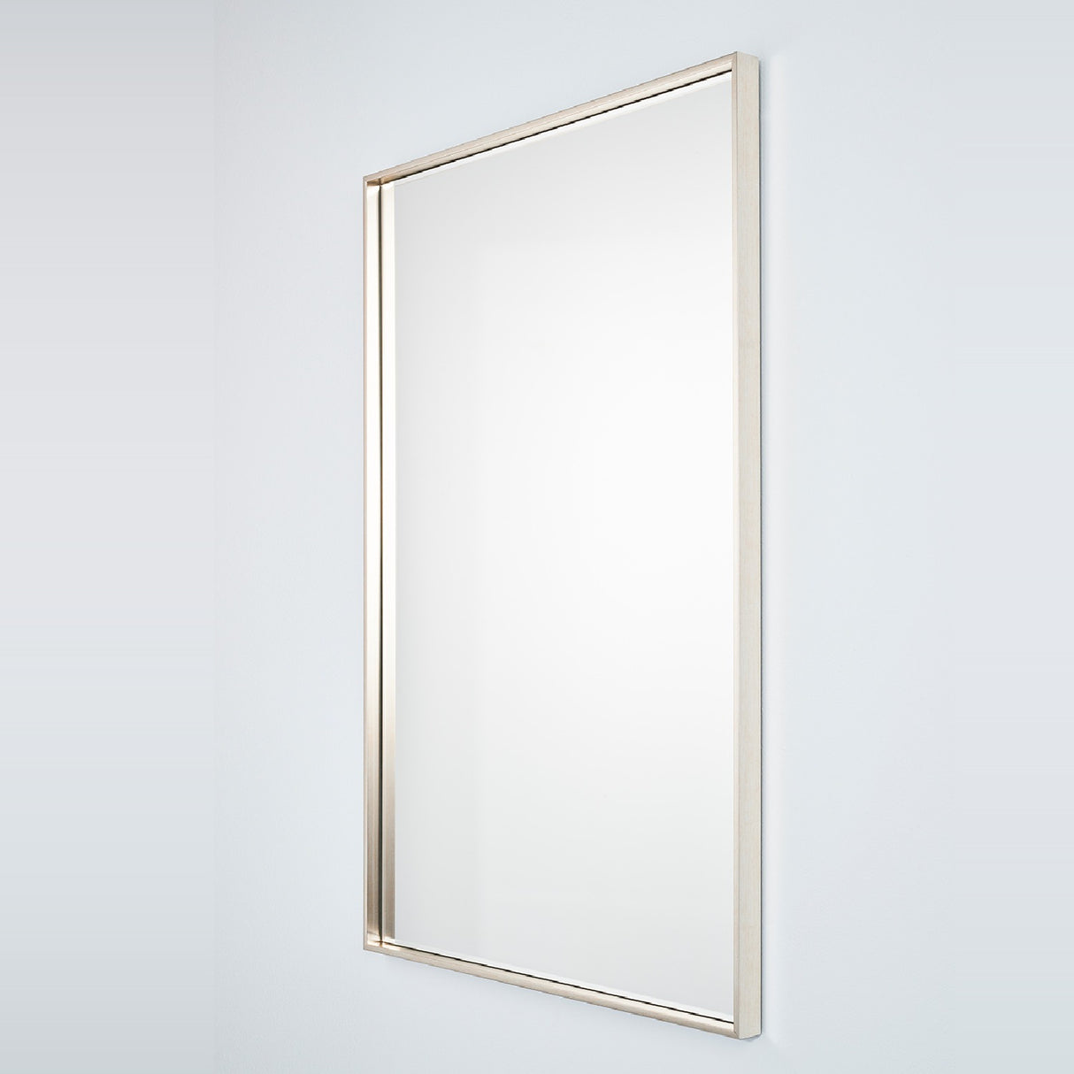 Soho Silver Slim Framed Rectangular Wall Mirror, 121cm, with a narrow pale silver frame, shown at an angle against a plain light background.